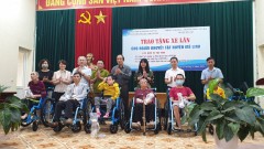 Giving wheelchairs for disable people